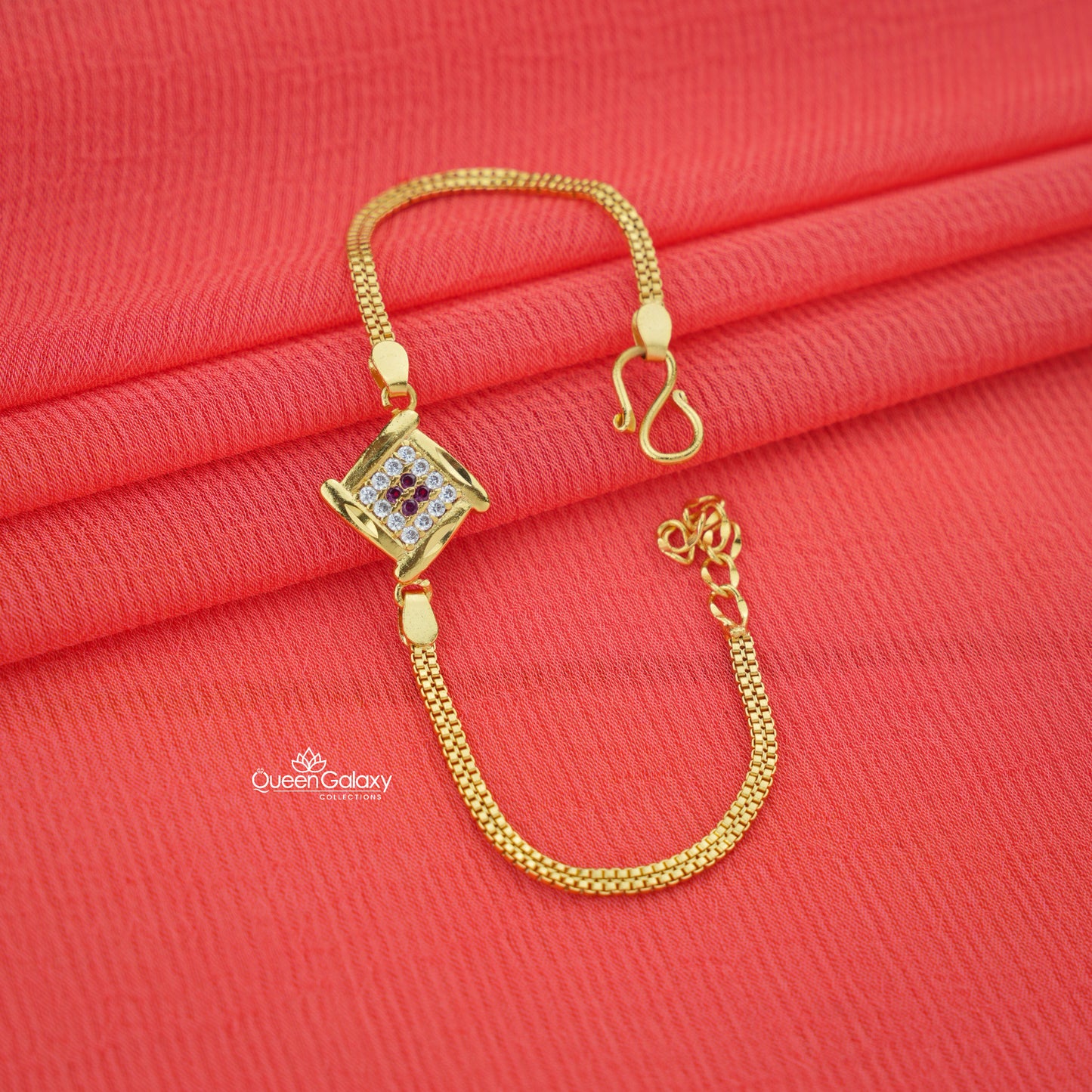 Gold plated box bracelet with a AD stone pendant - queen galaxy collection