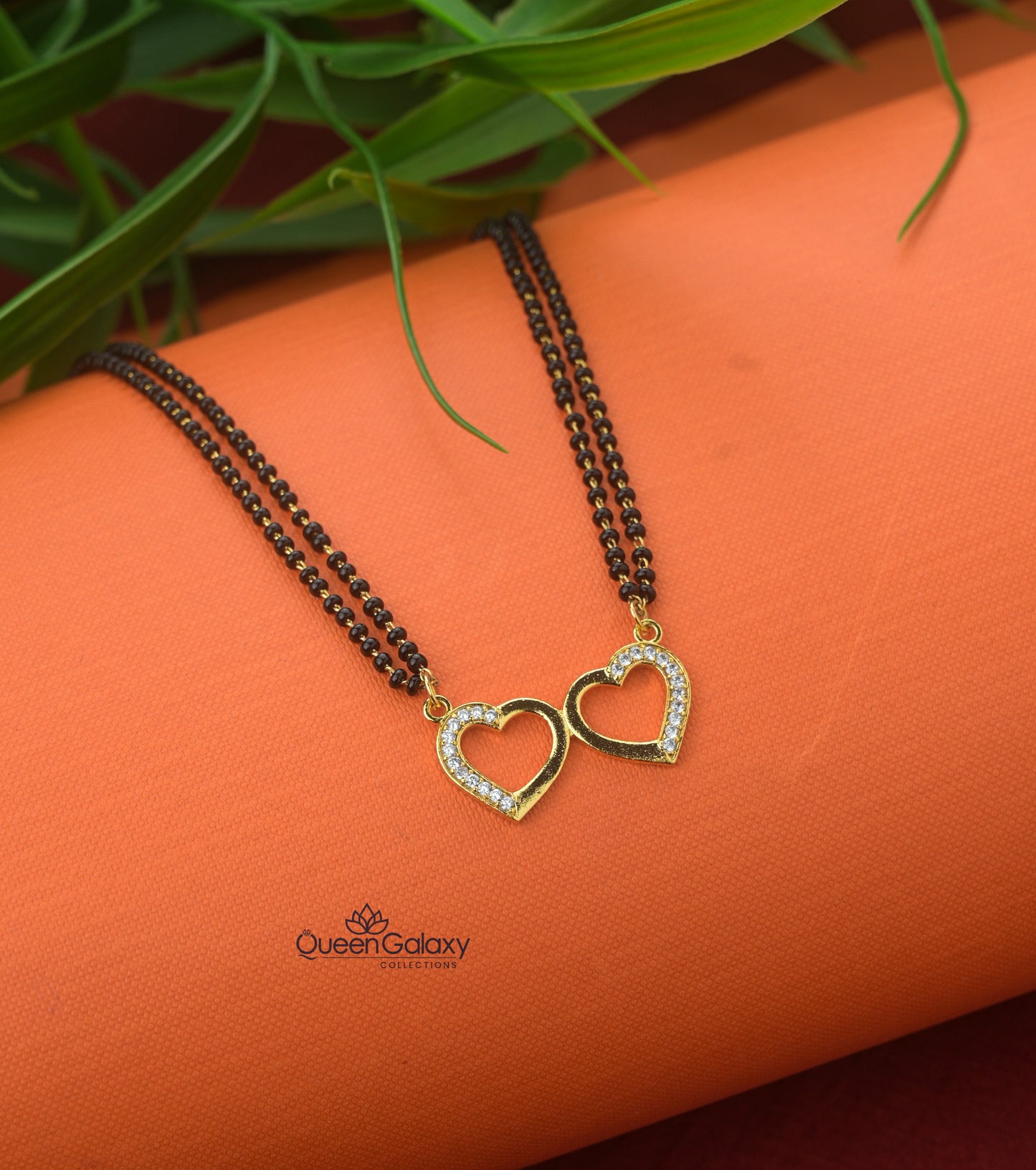 Goldplated 2 Line Karimanimala With AD Stone Pendant