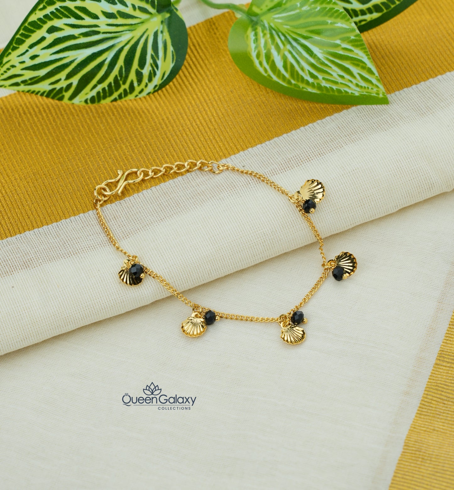Gold Plated Bracelet with Shell Charms & Black Beads
