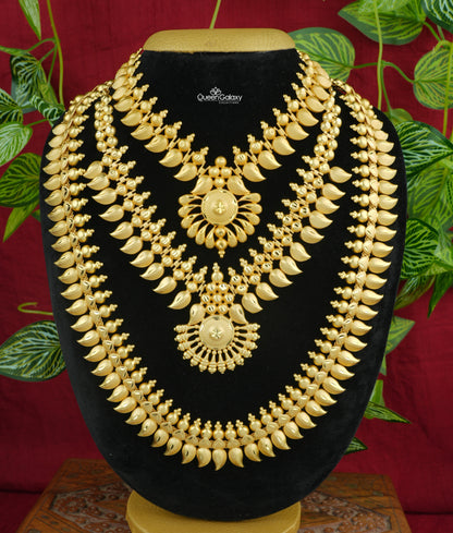 Gold Plated Bridal Set – Necklaces & Longharam jewelry set displayed on a mannequin, consisting of two necklaces with intricate designs and traditional bridal motifs.