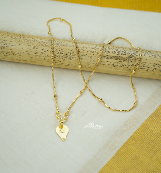 Gold plated Hindu thali chain with Om pendant - queen galaxy collection