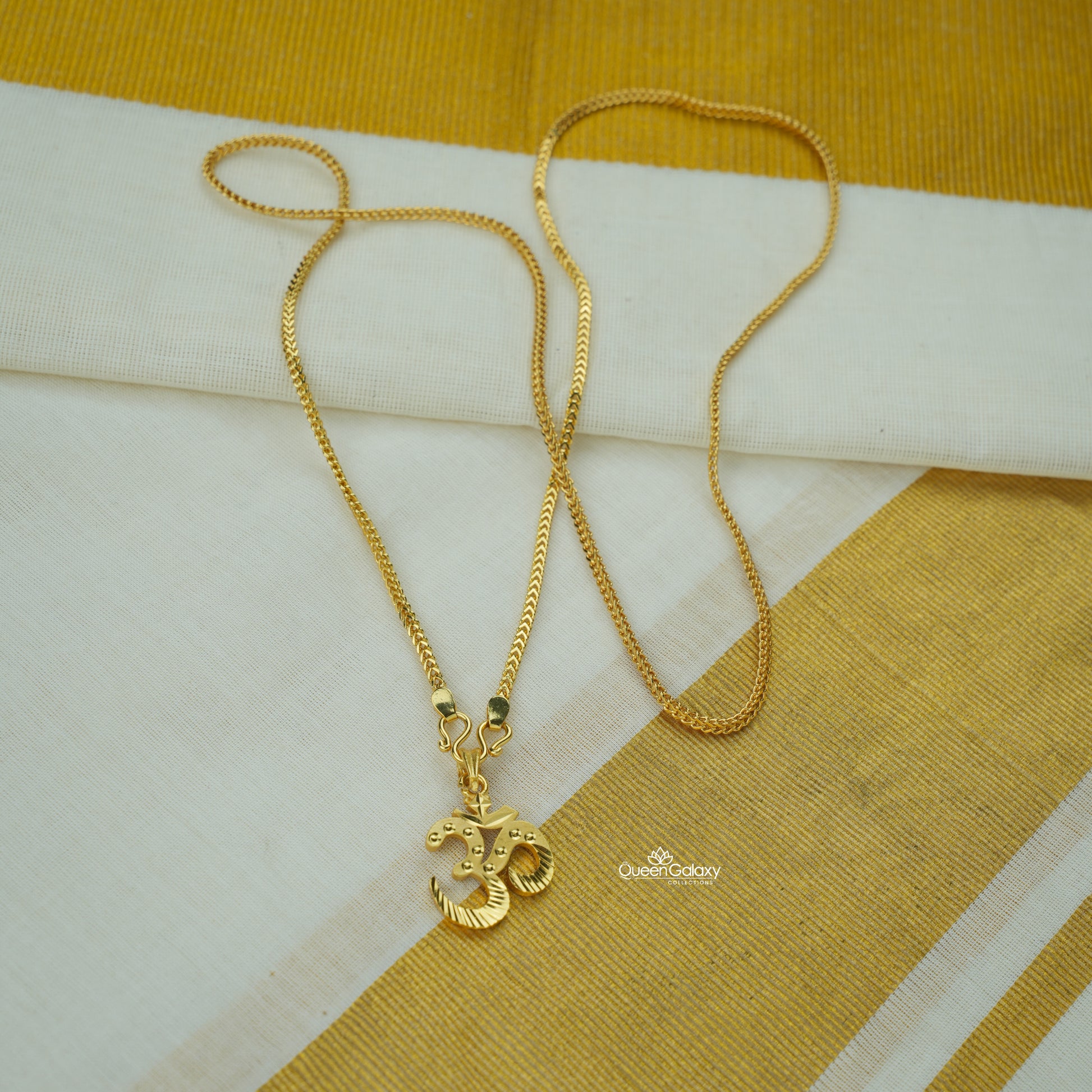 Gold plated chain with Om pendant