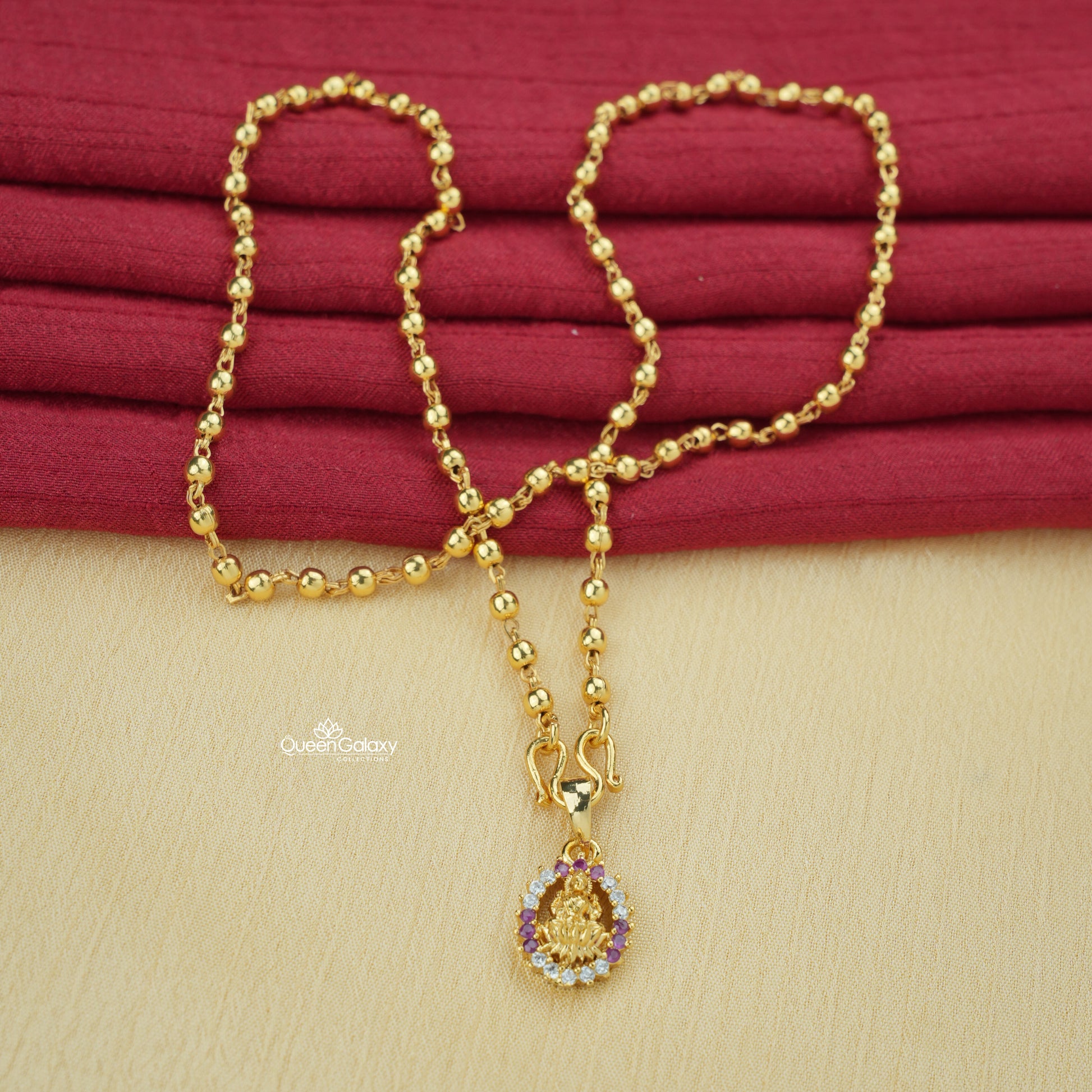 Gold plated beaded chain with AD stone Lakshmi pendant