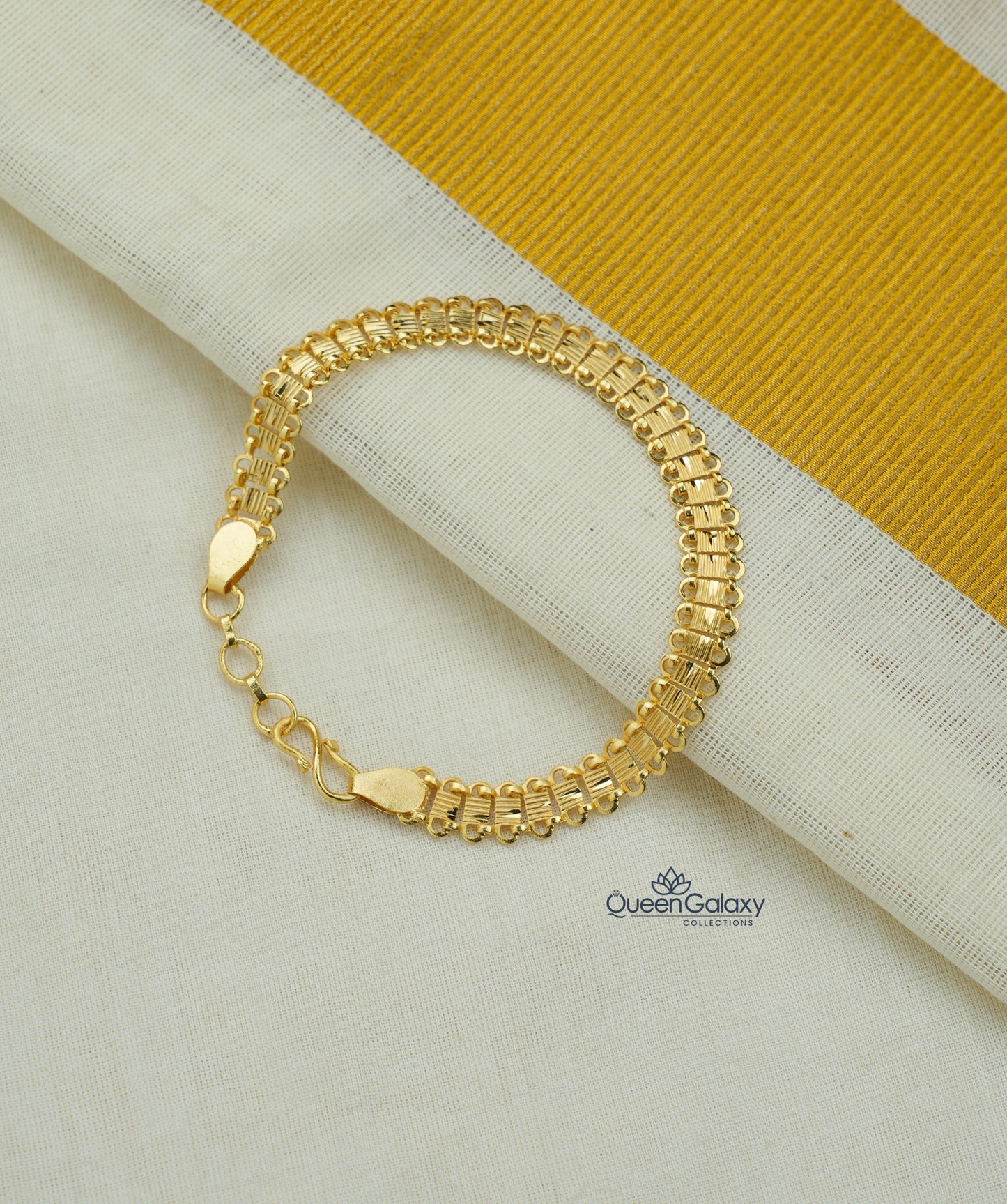 Traditional Style Gold Plated Broad Link Bracelet at queen galaxy collection