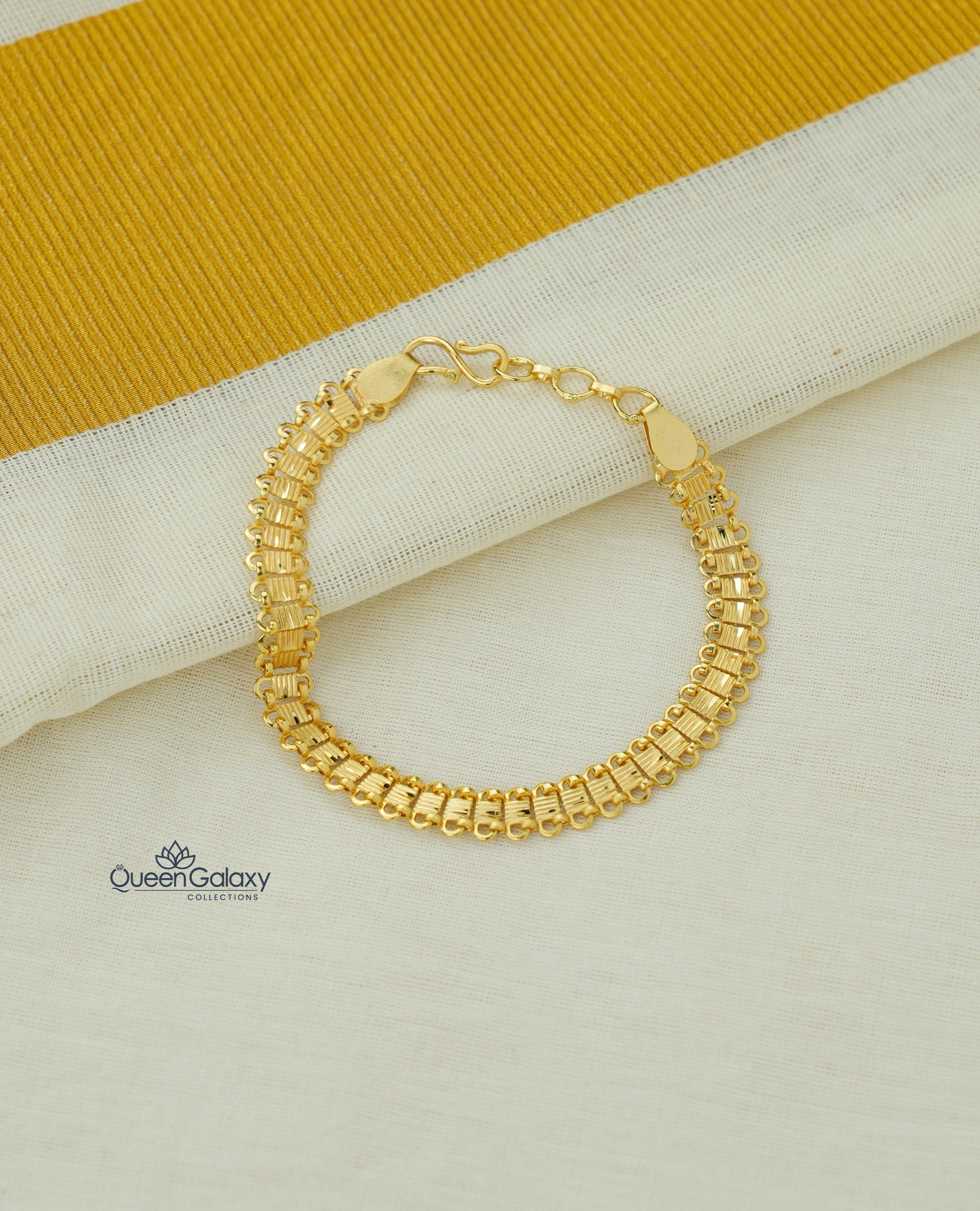 Traditional Style Gold Plated Broad Link Bracelet at queen galaxy collection