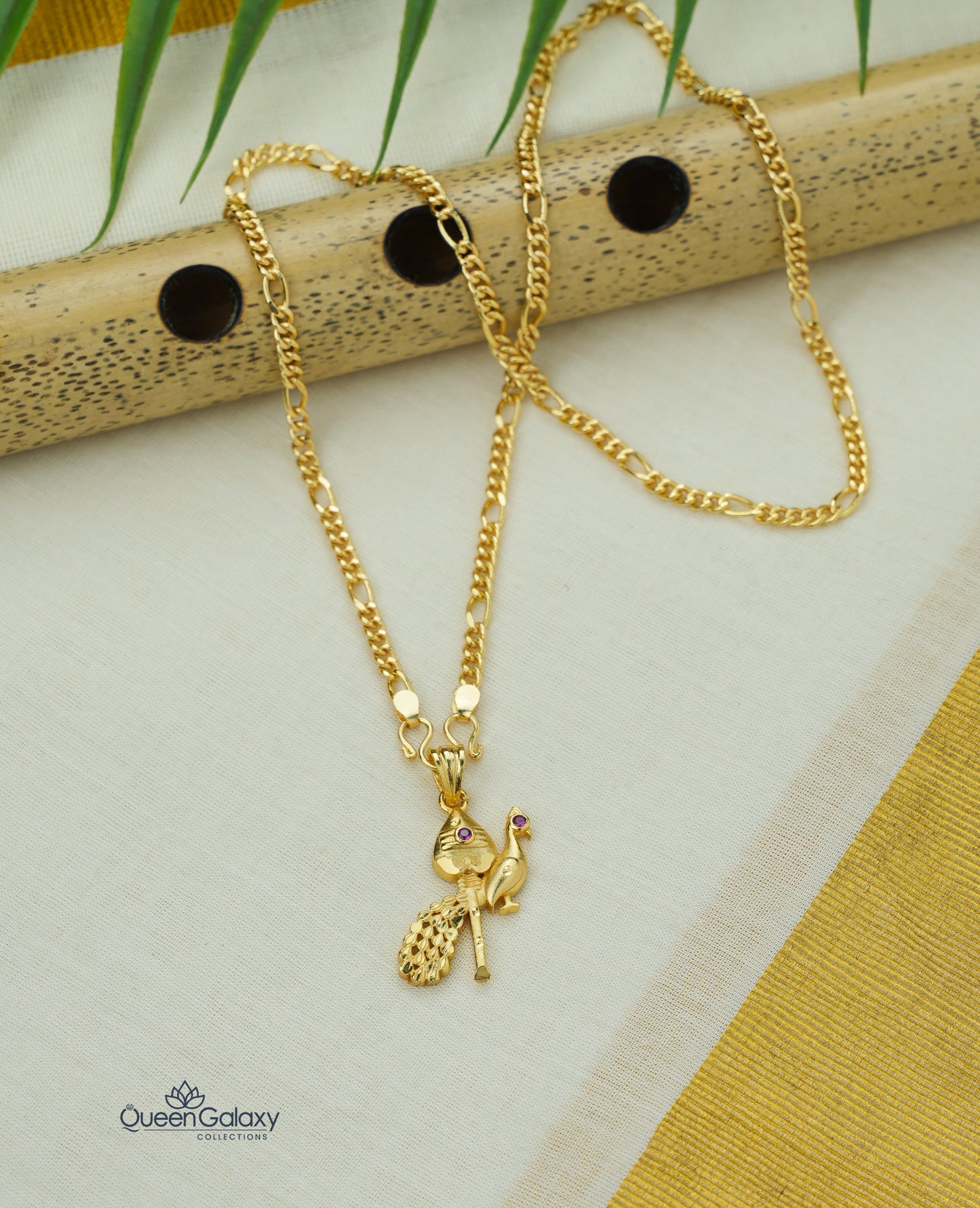 Gold Plated Figaro Chain With Peacock Pendant